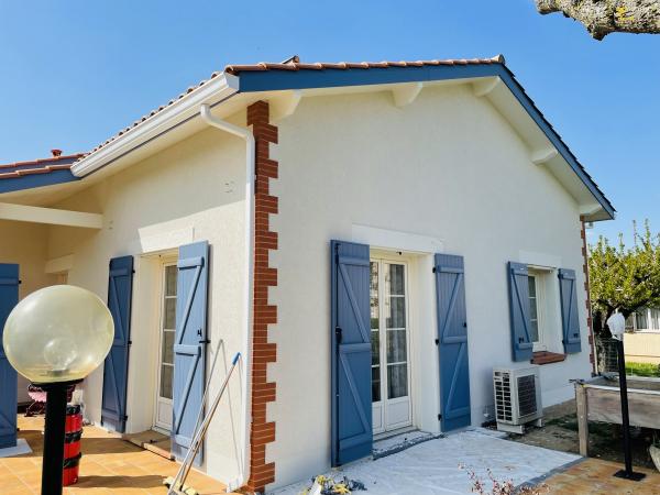 réalisation d'une façade taloché grain moyen finition D3 / I4